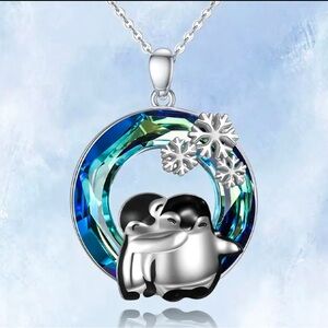 Cute Penguins hugging /snowflakes turquoise round pendant necklace